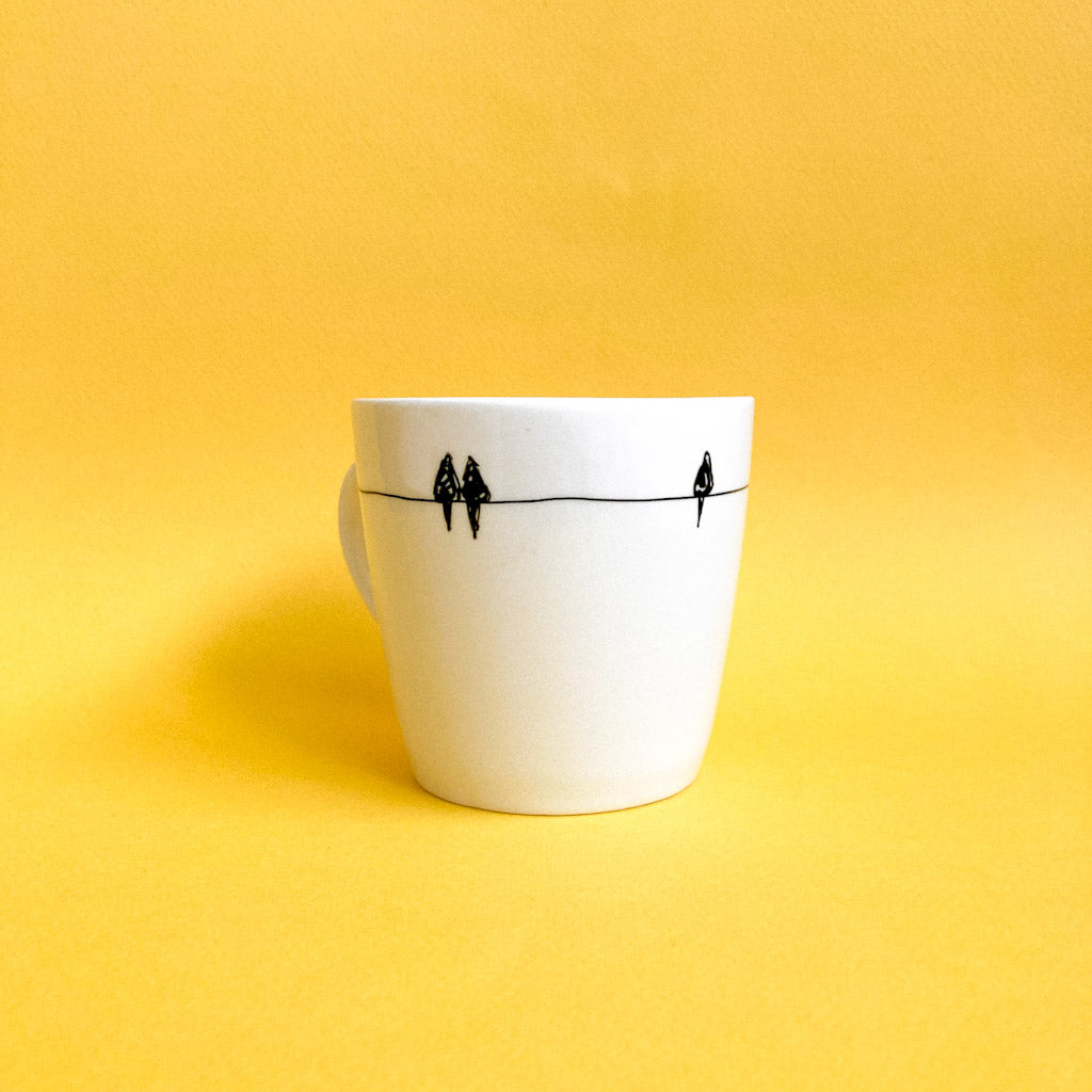 Tasse avec petits oiseaux