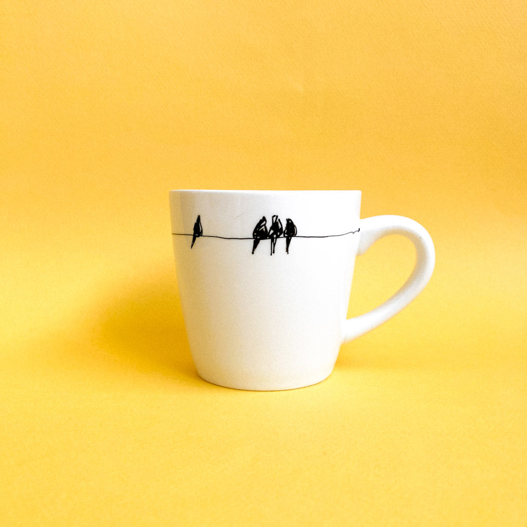 Tasse avec petits oiseaux