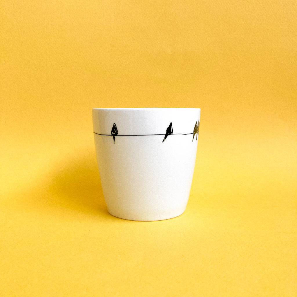 Tasse avec petits oiseaux