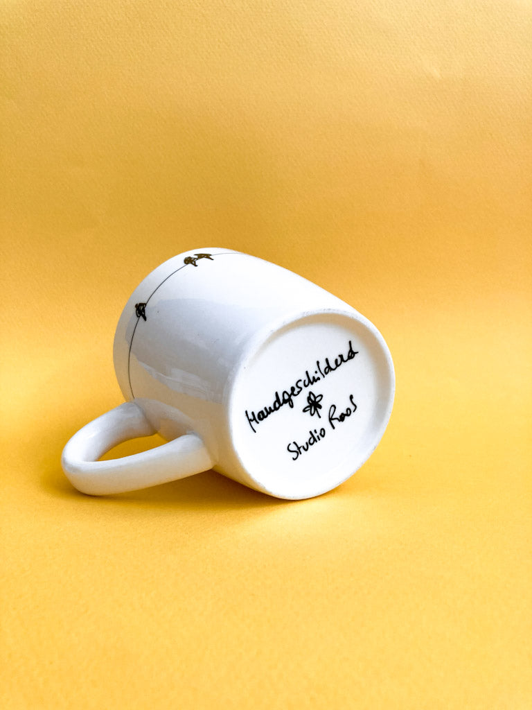 Tasse avec petits oiseaux